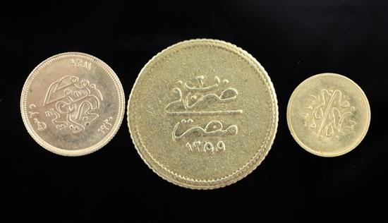 Three Egyptian gold coins, 10.6g gross, VF or better